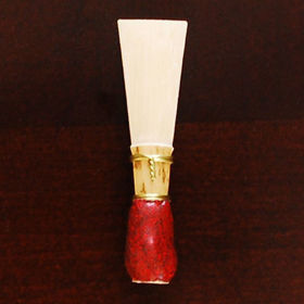 Red student bassoon reed